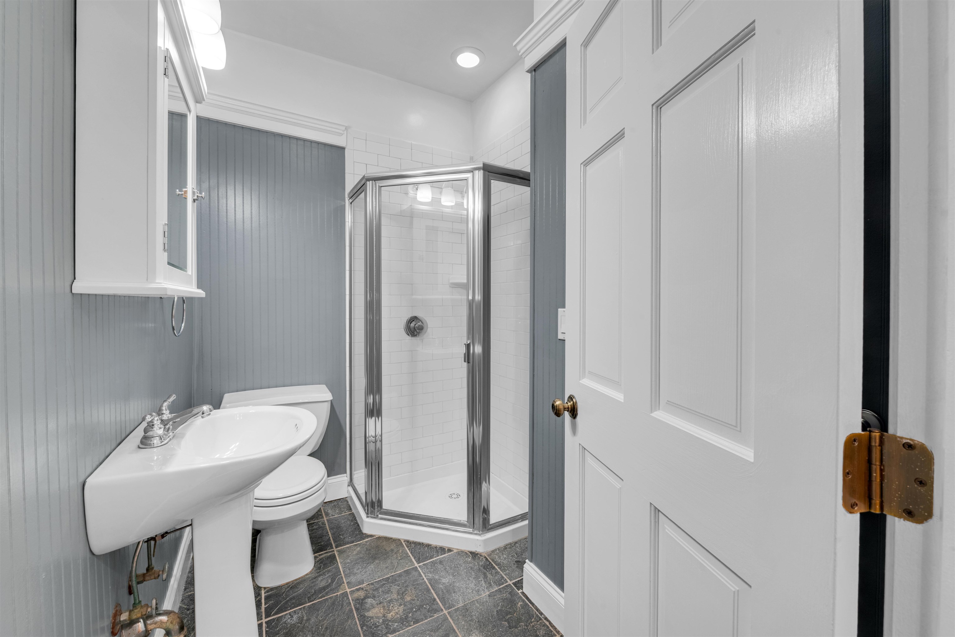 312 Monastery Place, Unit 2R Union City, NJ 07087 - Photo 10 of 15 a bathroom with a sink and mirror