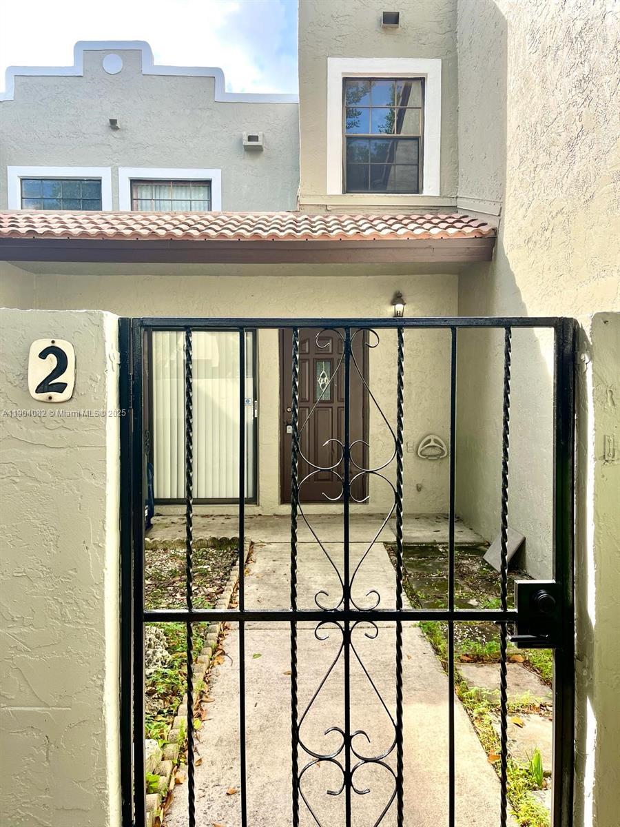 10445 Southwest 154th Court, Unit 2 Miami, FL 33196 - Photo 3 of 11 a view of front door