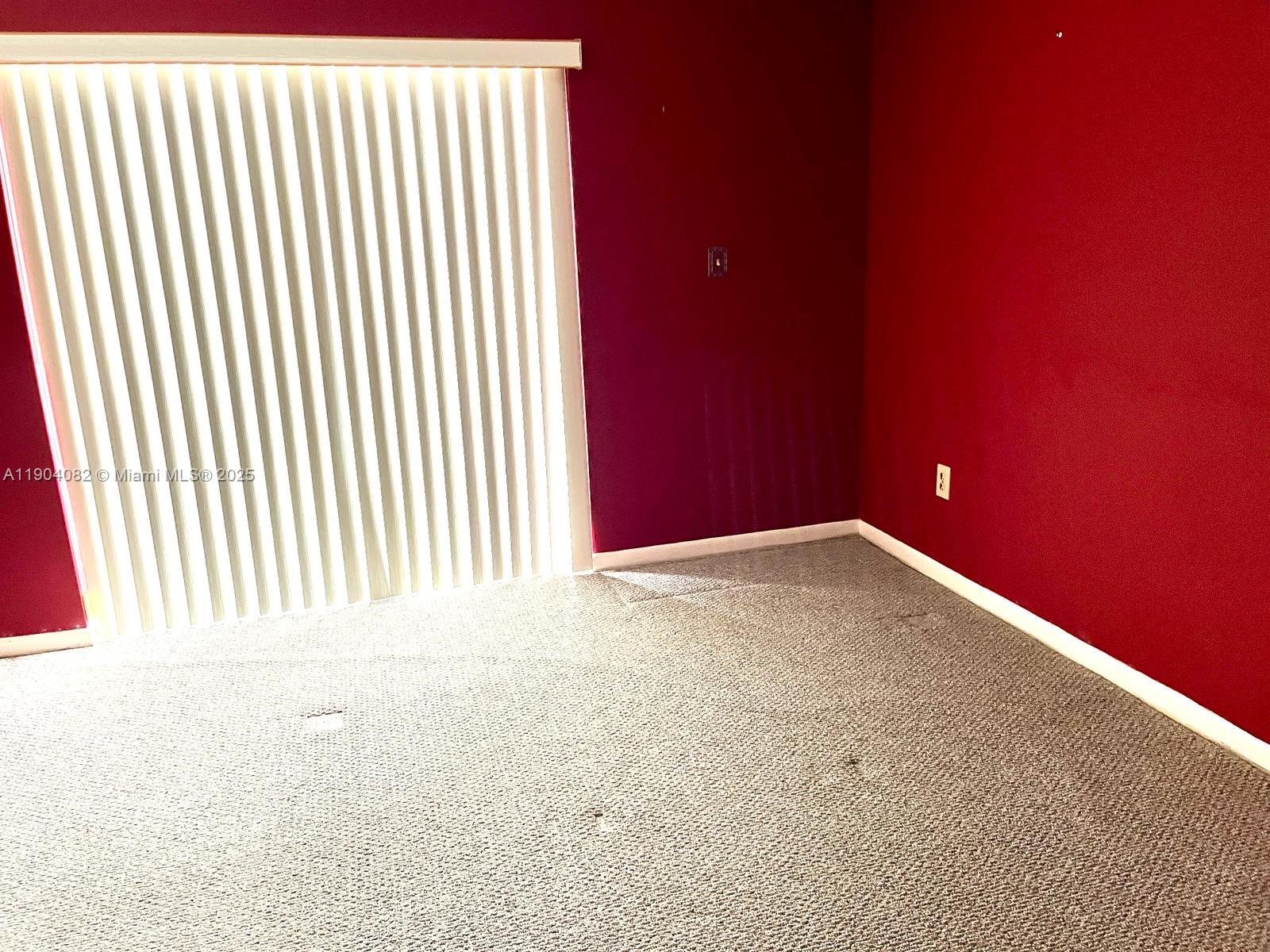 10445 Southwest 154th Court, Unit 2 Miami, FL 33196 - Photo 8 of 11 a view of empty room