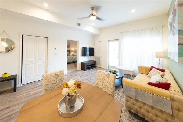 a living room with furniture and a couch