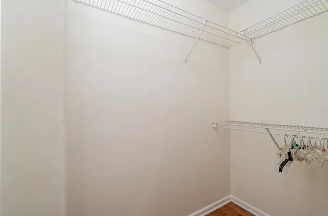 a view of a room with racks on the wall