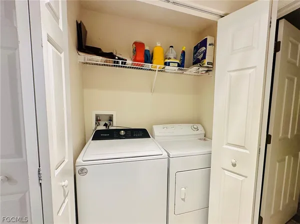 a utility room with dryer and washer