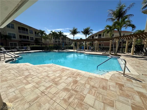 a view of a house with swimming pool