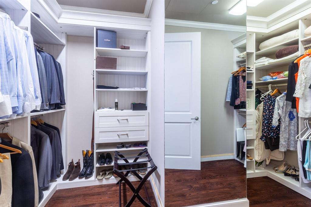 2525 North Pearl Street, Unit 1105 Dallas, TX 75201 - Photo 18 of 38 a view of walk in closet with clothes and shoes