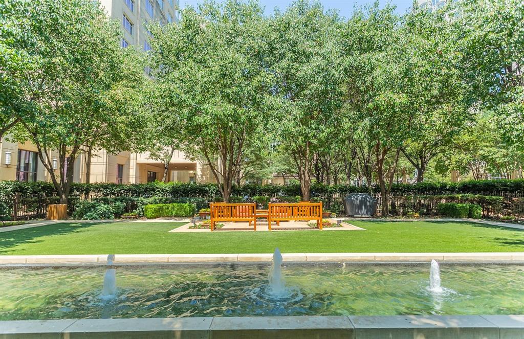 2525 North Pearl Street, Unit 1105 Dallas, TX 75201 - Photo 34 of 38 a view of a house with a yard and large trees