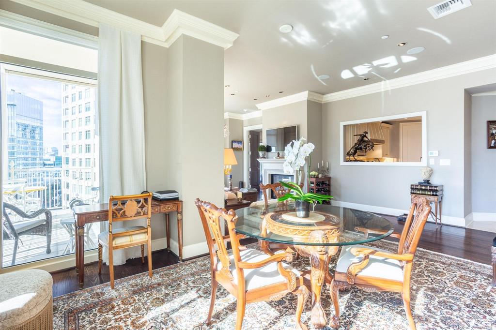 2525 North Pearl Street, Unit 1105 Dallas, TX 75201 - Photo 8 of 38 a view of a dining room with furniture