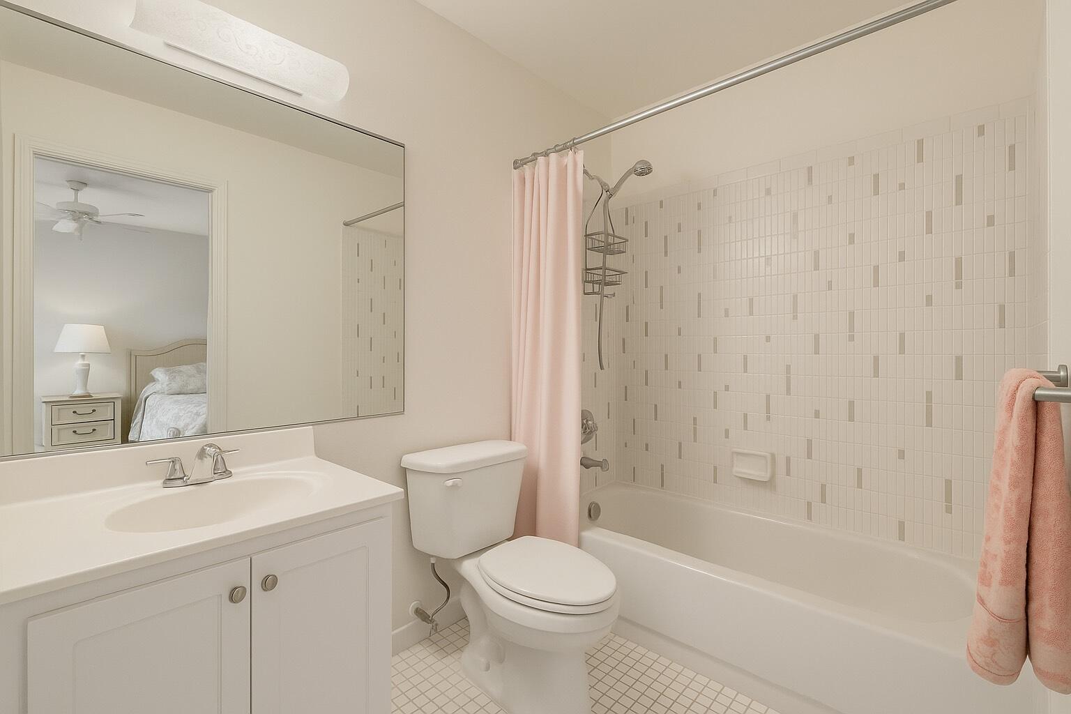 375 Southwest 56th Avenue, Unit 217 Margate, FL 33068 - Photo 7 of 15 a bathroom with a sink toilet and shower
