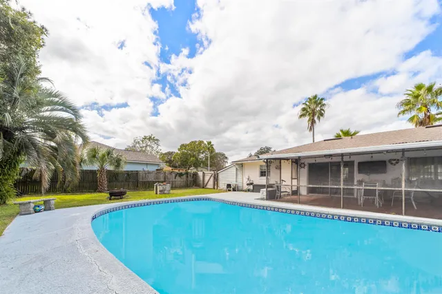 a view of outdoor space and swimming pool