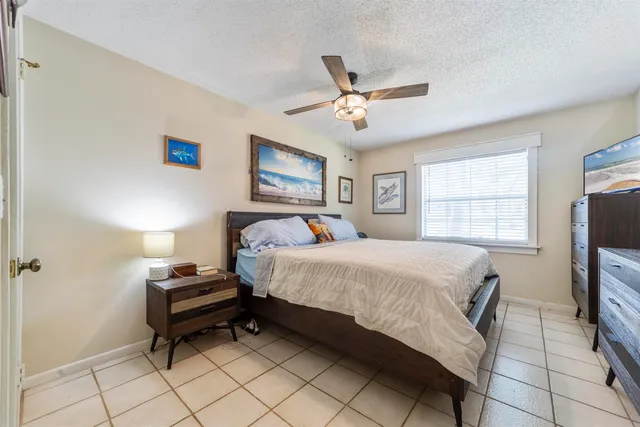 a view of a livingroom with furniture and windows
