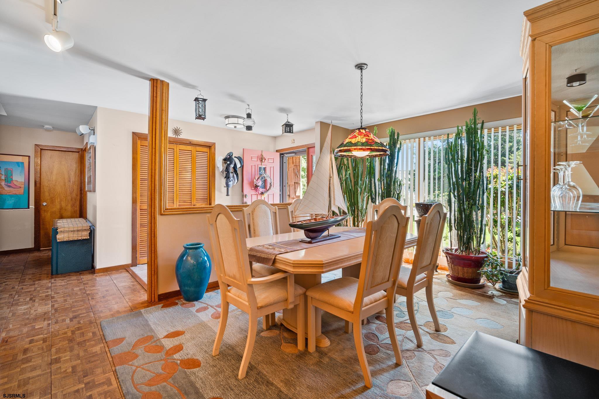 202 North Shore Road Marmora, NJ 08223 - Photo 13 of 31 a dining room with furniture window wooden floor