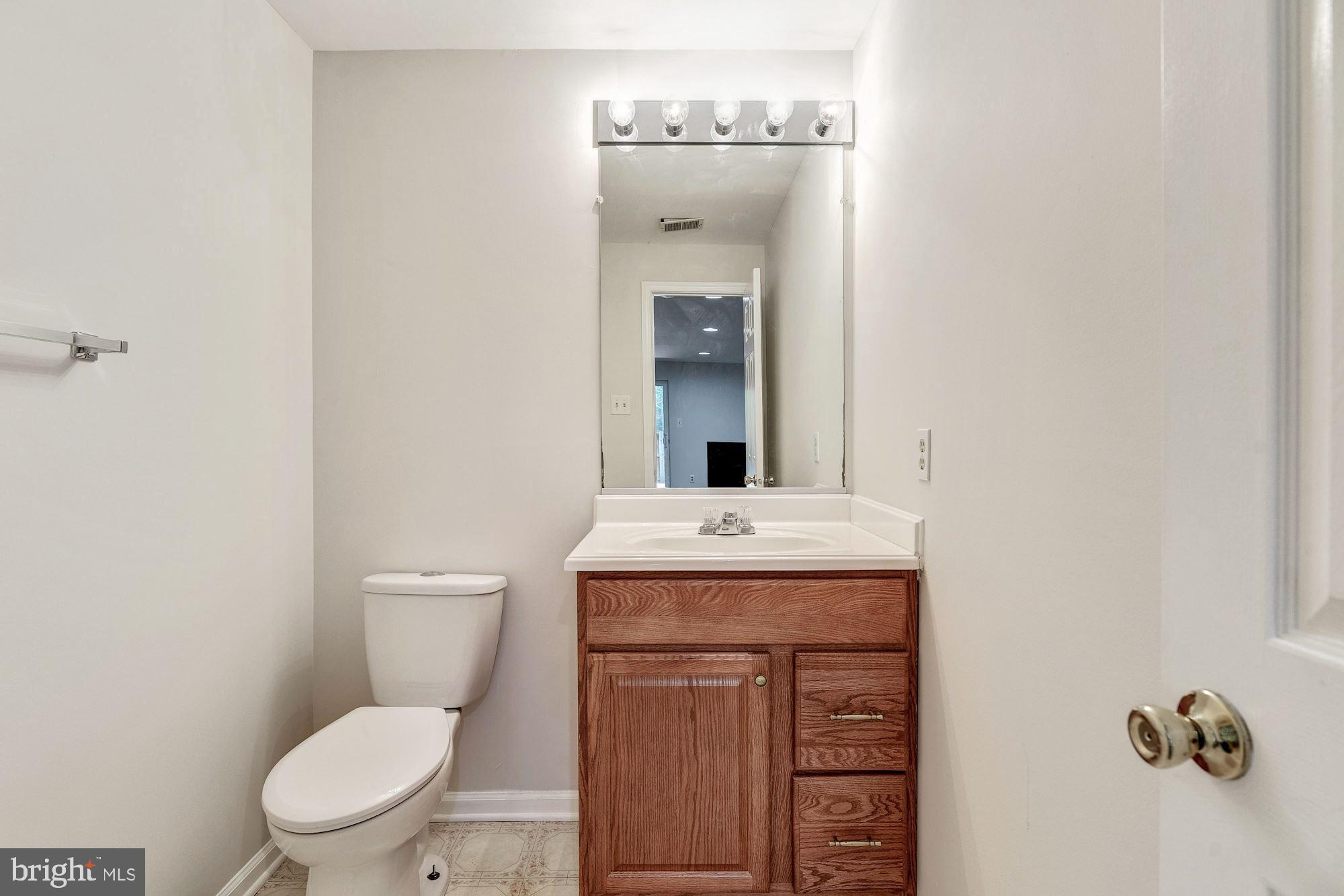 4685 Columbia Road Ellicott City, MD 21042 - Photo 25 of 32 Lower level powder room