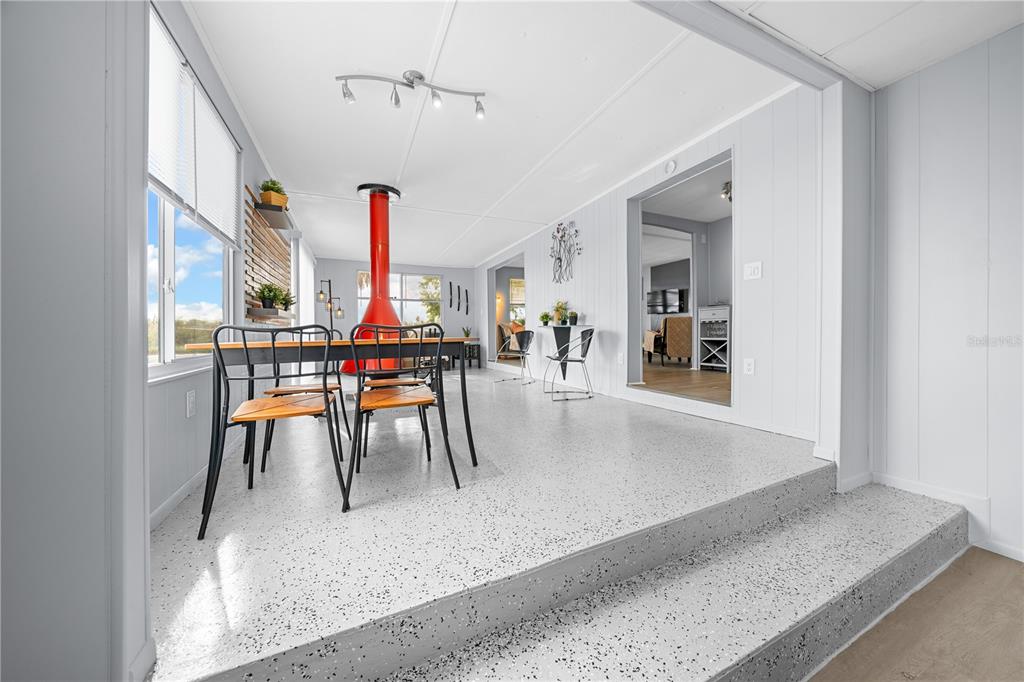 426 Northwest 5th Road Lake Panasoffkee, FL 33538 - Photo 26 of 51 a view of a livingroom with furniture and a rug