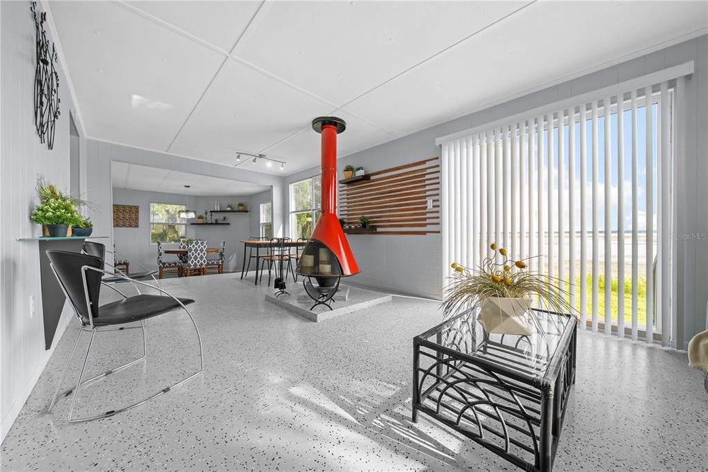 426 Northwest 5th Road Lake Panasoffkee, FL 33538 - Photo 29 of 51 a view of an empty room and floor to ceiling window