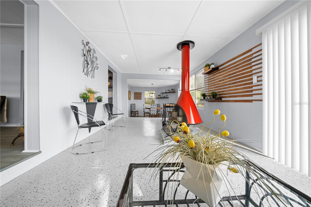 426 Northwest 5th Road Lake Panasoffkee, FL 33538 - Photo 31 of 51 a living room with furniture and a potted plants