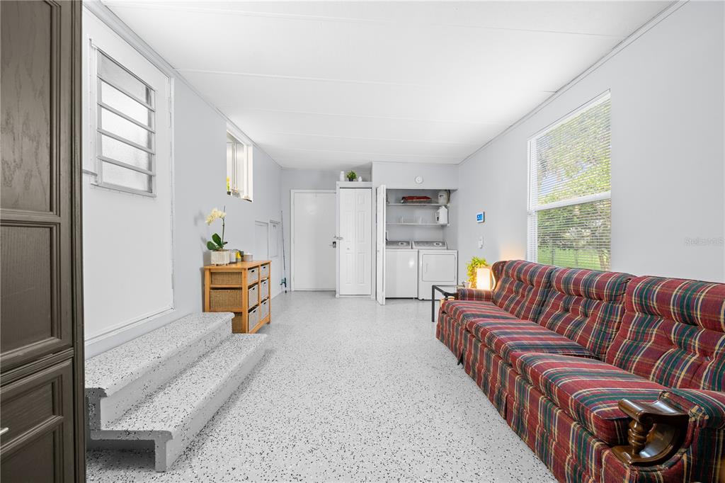 426 Northwest 5th Road Lake Panasoffkee, FL 33538 - Photo 39 of 51 a living room with furniture and a couch