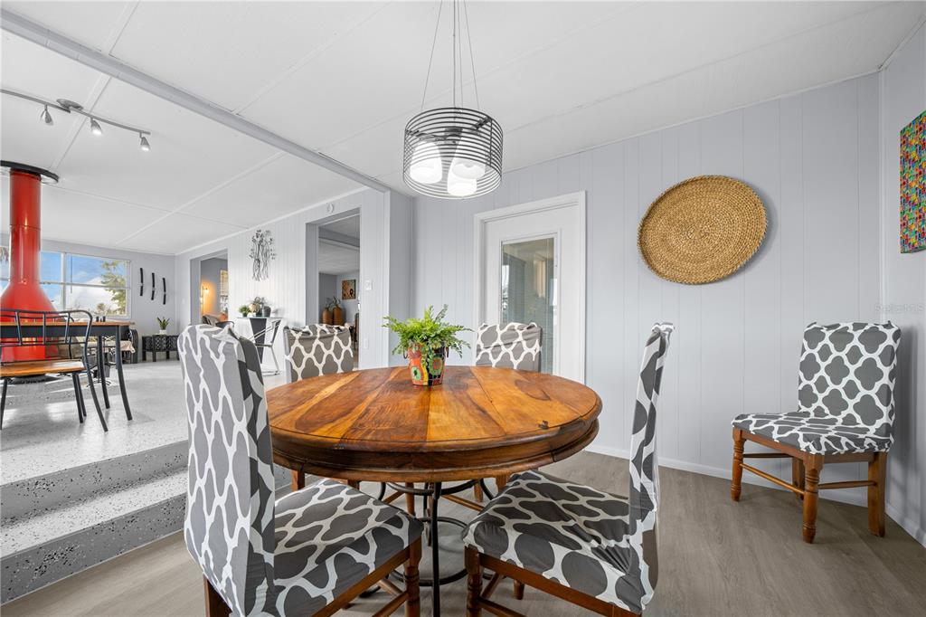 426 Northwest 5th Road Lake Panasoffkee, FL 33538 - Photo 10 of 51 a view of a dining room with furniture