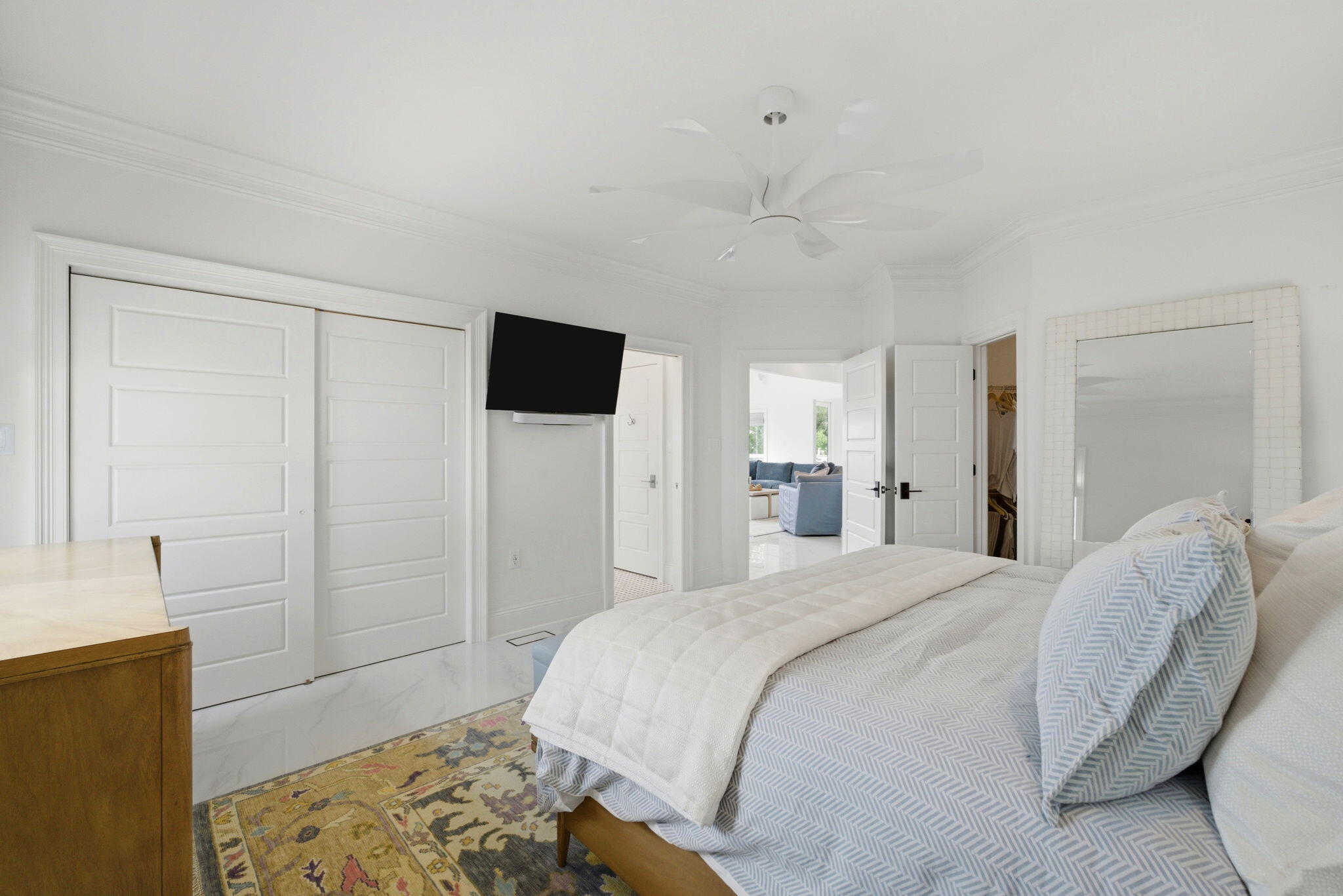 31061 Peninsula Drive Orange Beach, AL 36561 - Photo 30 of 93 a spacious bedroom with a bed and a television