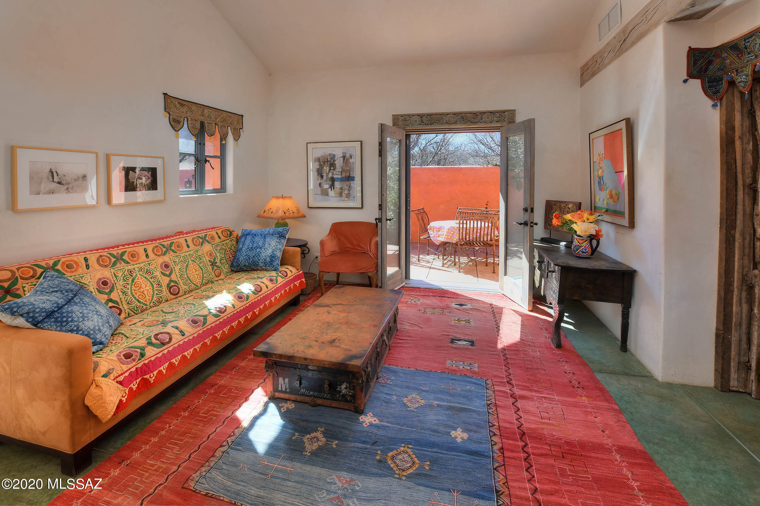 360 Harshaw Creek Road Patagonia, AZ 85624 - Photo 32 of 50 a living room with furniture and a gate