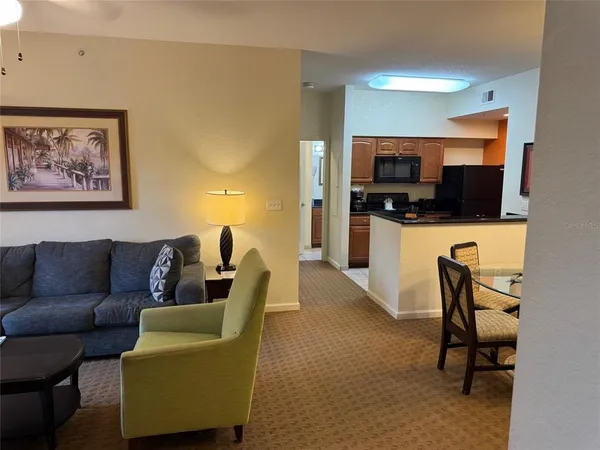 a view of a dining room with furniture