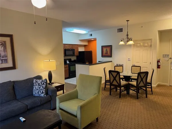 a view of a dining room with furniture