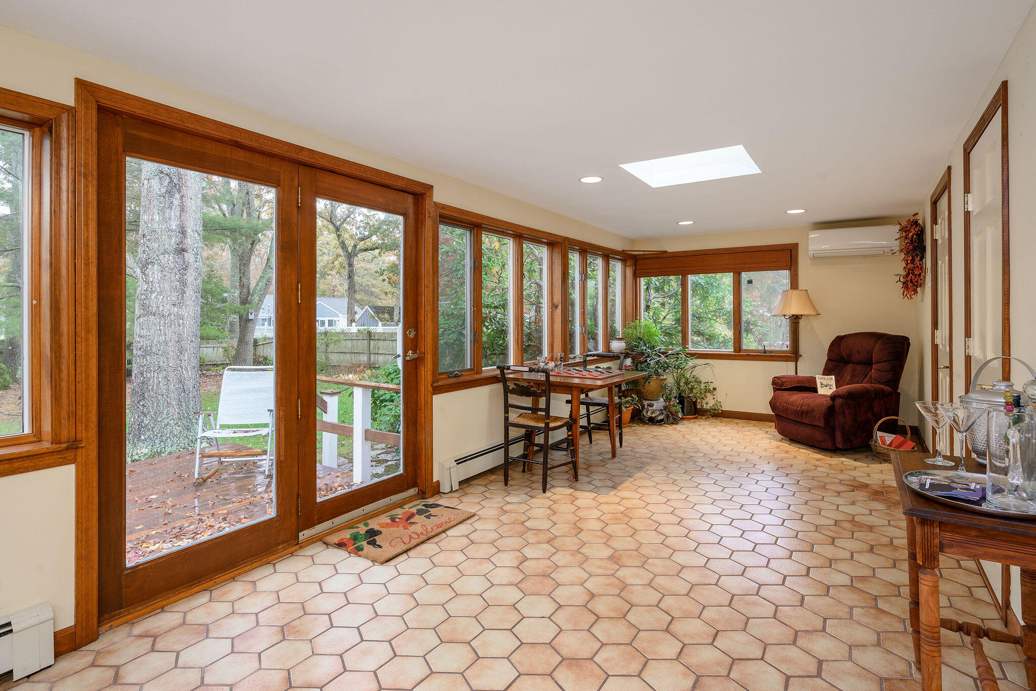 256 Buckskin Path Centerville, MA 02632 - Photo 13 of 38 a view of a livingroom with furniture water view and large windows