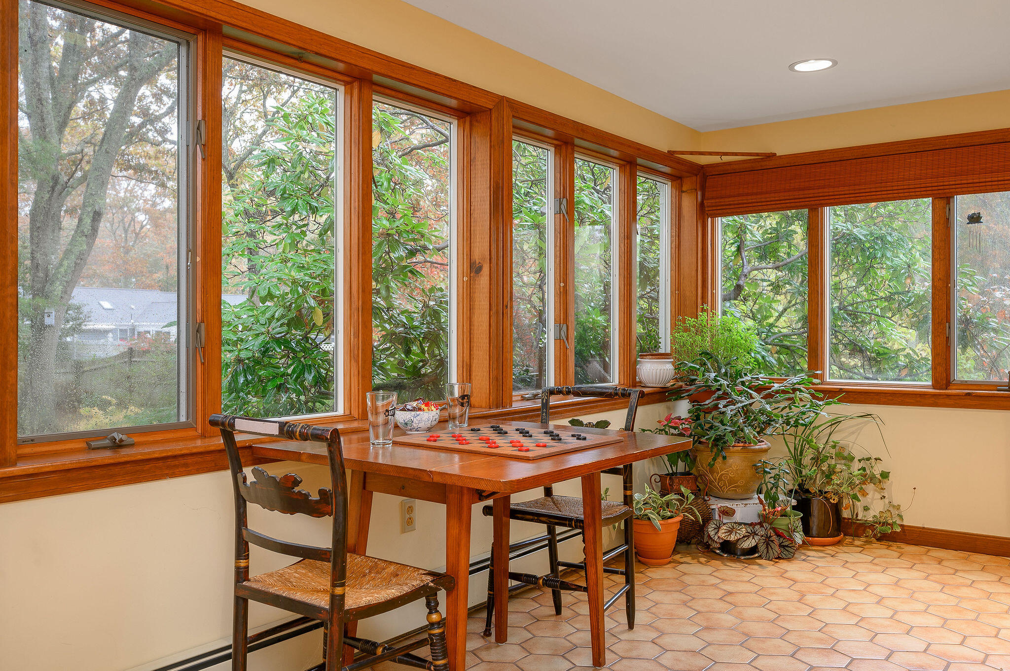256 Buckskin Path Centerville, MA 02632 - Photo 14 of 38 a dining room with furniture and large windows
