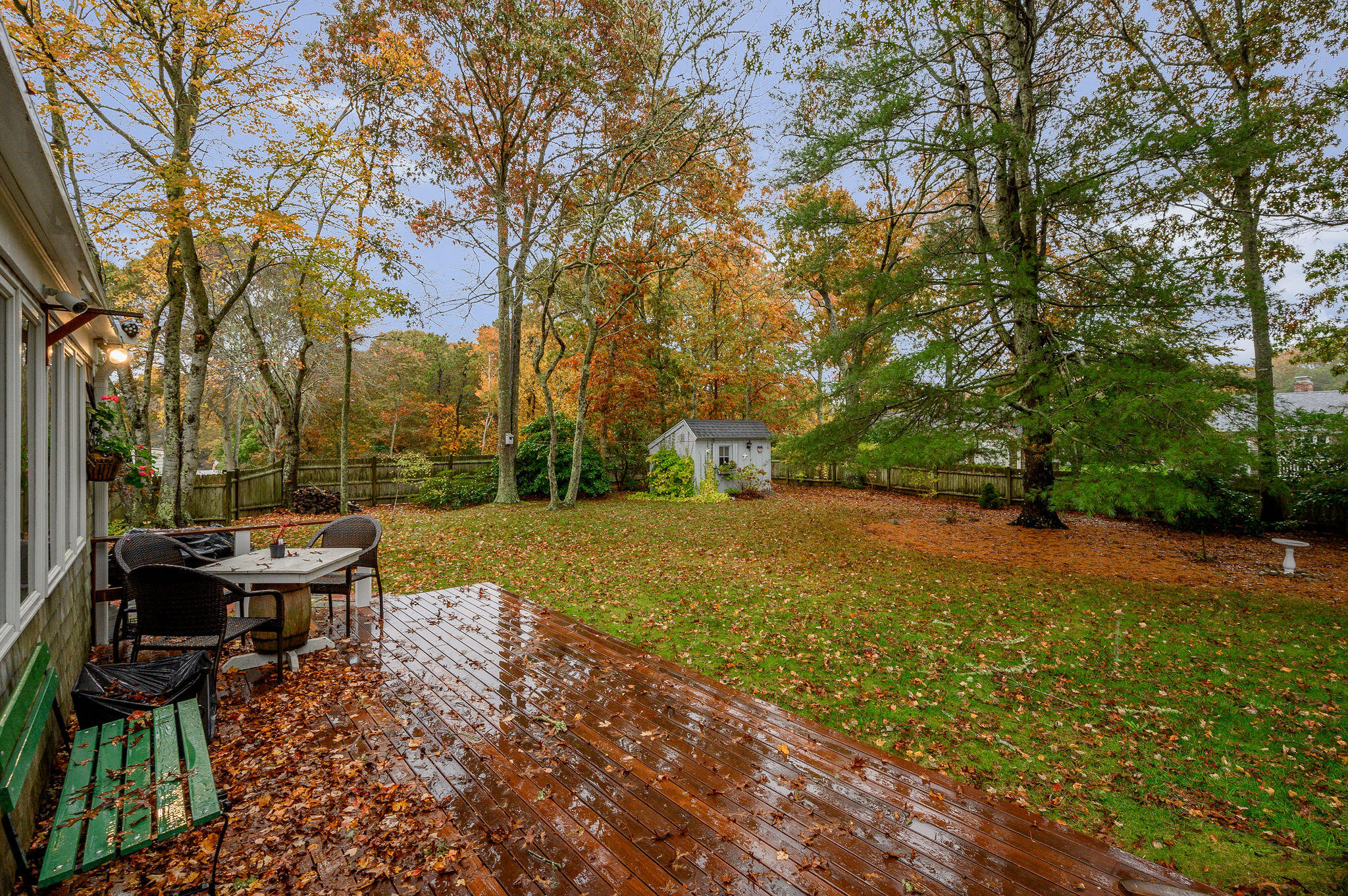 256 Buckskin Path Centerville, MA 02632 - Photo 30 of 38 a view of outdoor space with table and chairs