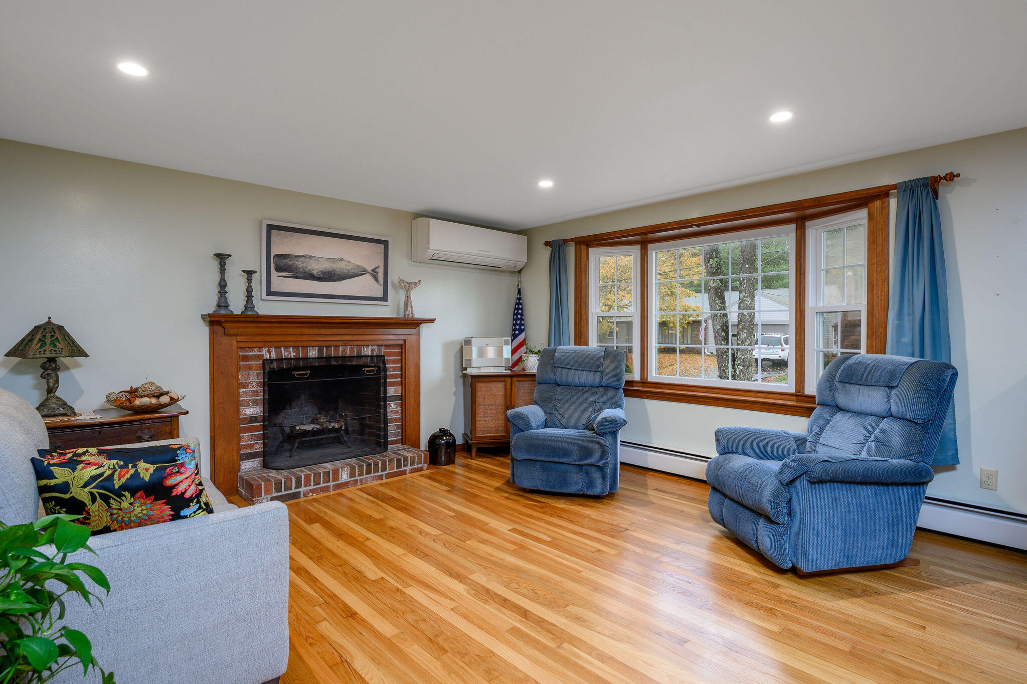 256 Buckskin Path Centerville, MA 02632 - Photo 3 of 38 a living room with furniture and a fireplace