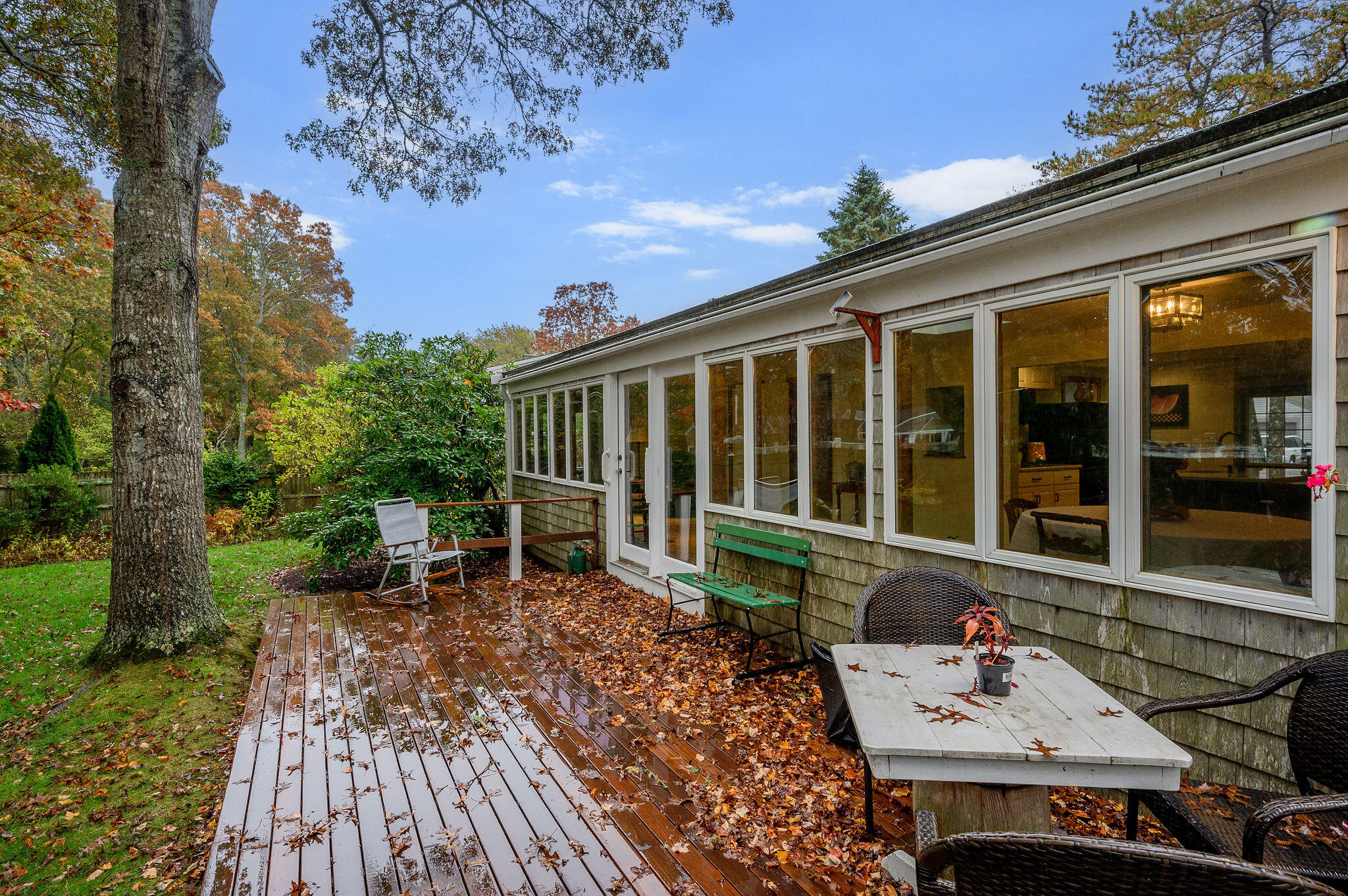 256 Buckskin Path Centerville, MA 02632 - Photo 31 of 38 a view of a house with backyard sitting area and garden