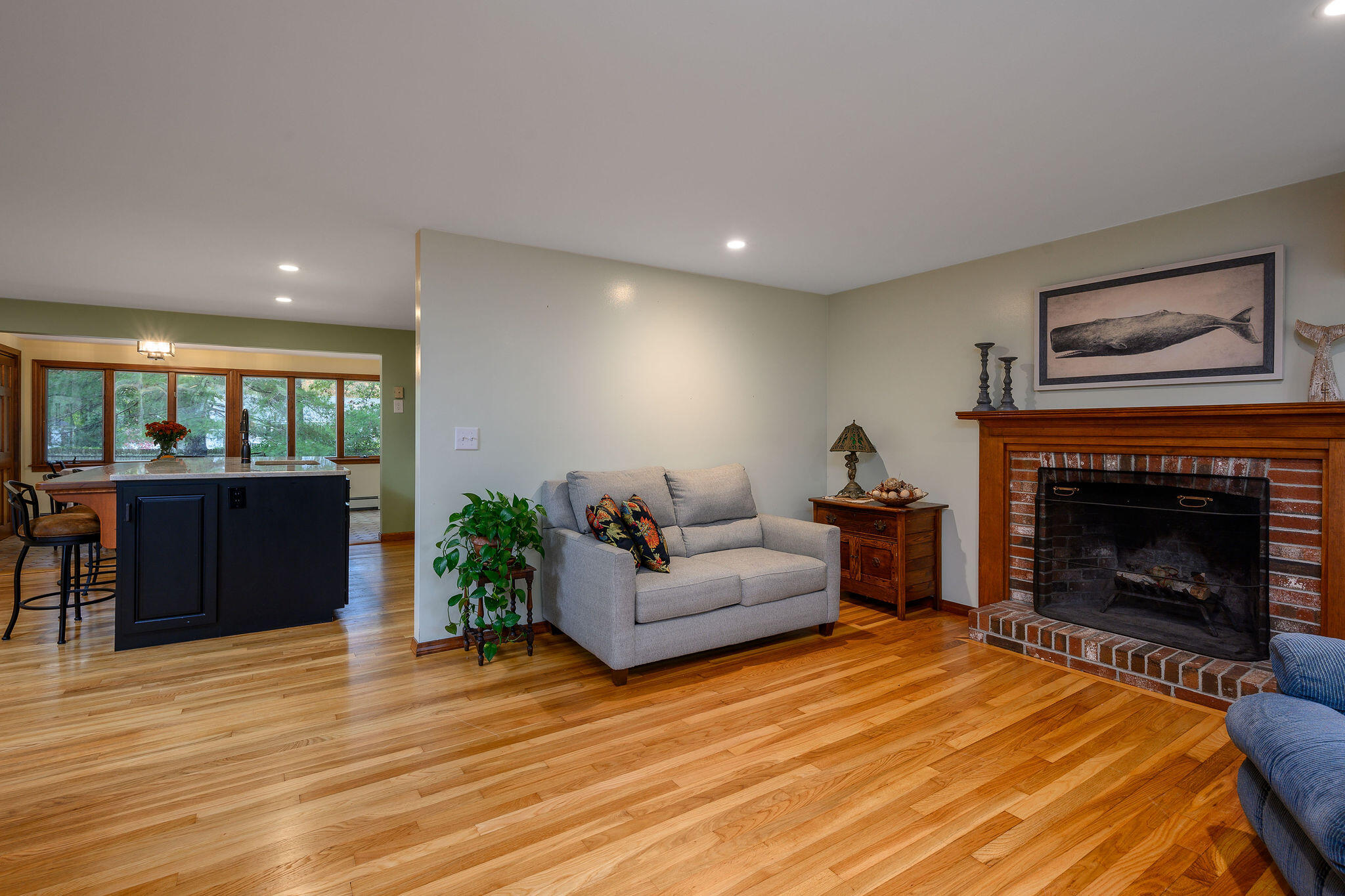 256 Buckskin Path Centerville, MA 02632 - Photo 5 of 38 a living room with furniture and a fireplace