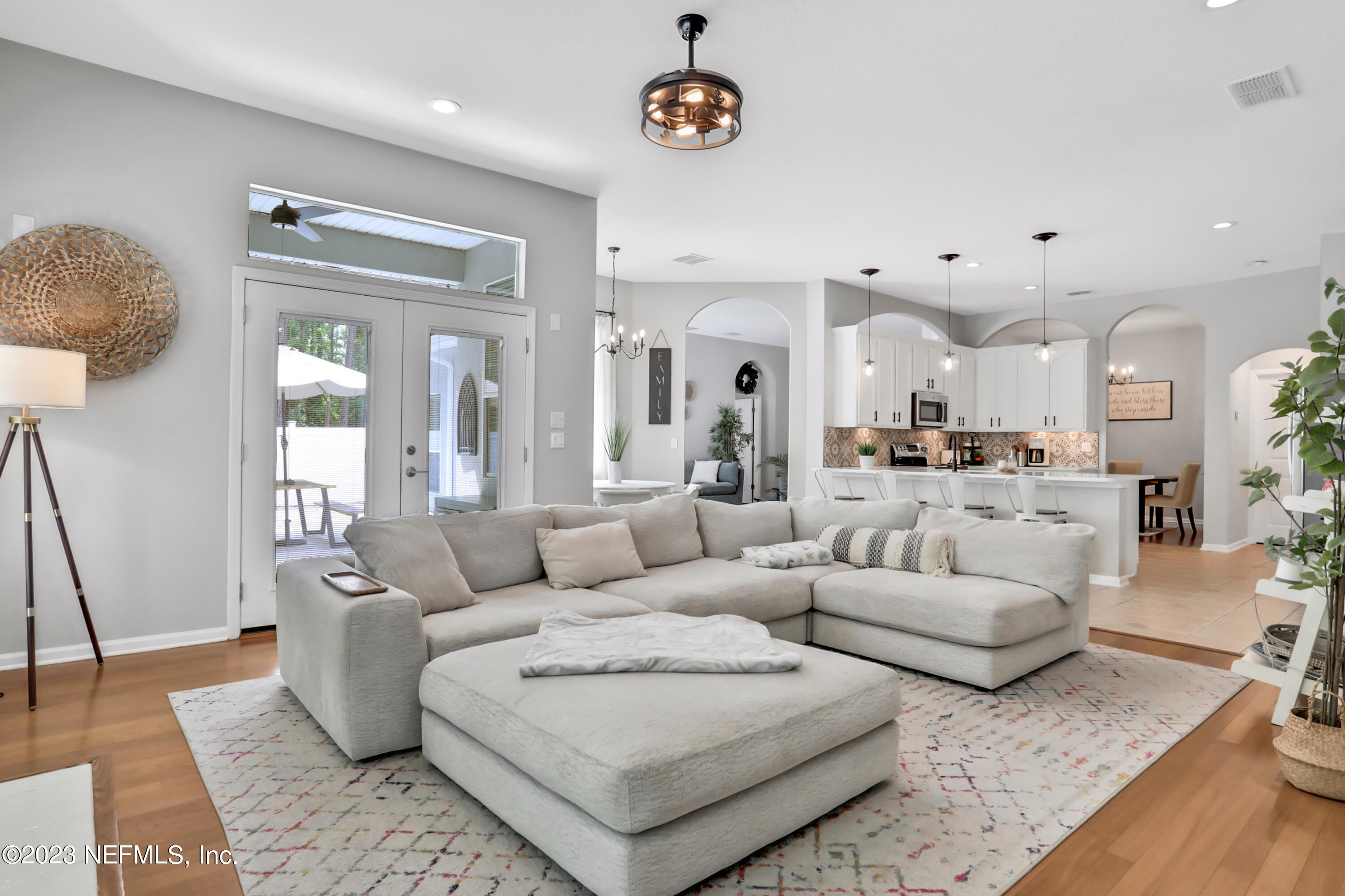 4100 Lonicera Loop St. Johns, FL 32259 - Photo 19 of 65 a living room with furniture and a wooden floor