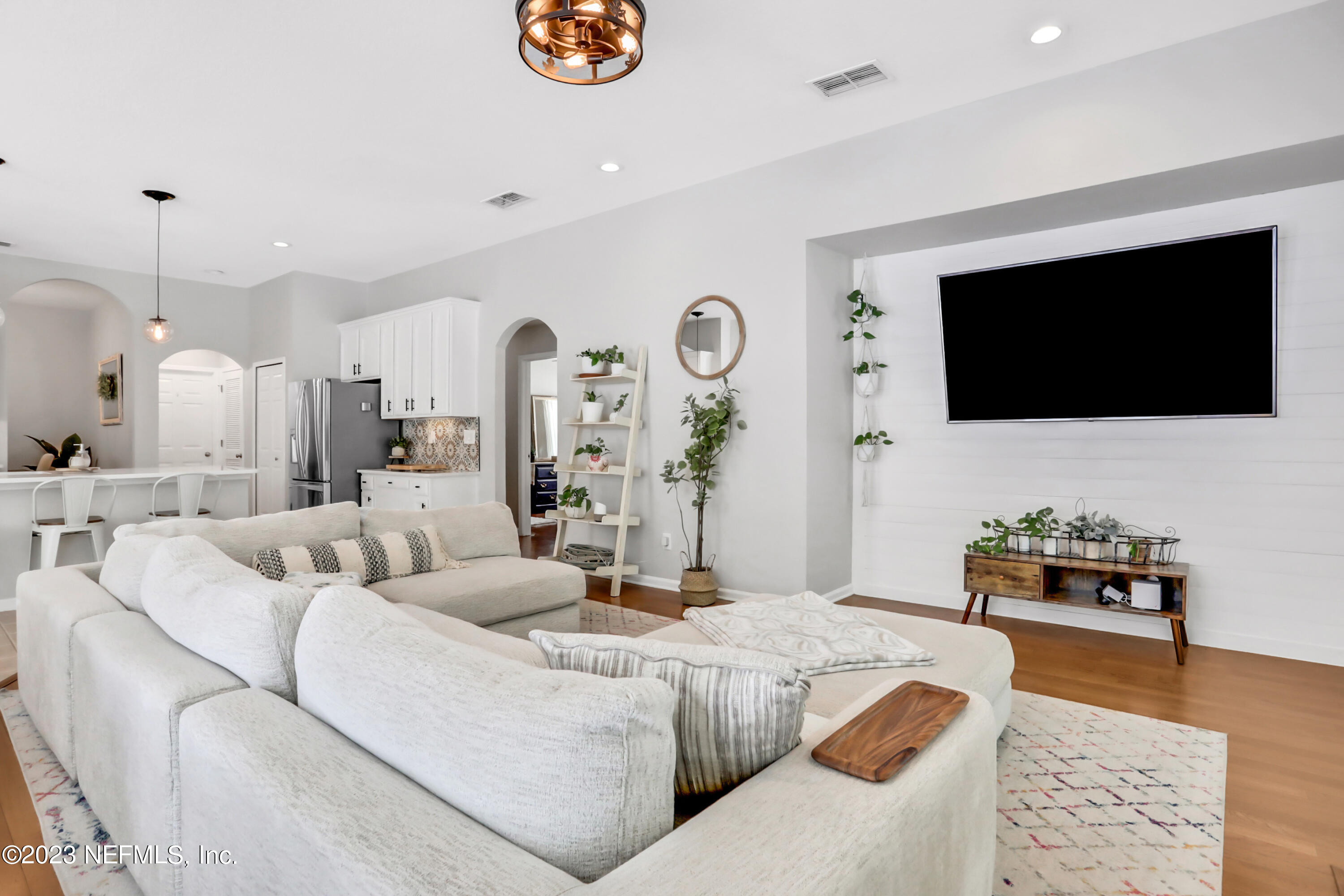 4100 Lonicera Loop St. Johns, FL 32259 - Photo 20 of 65 a living room with furniture and a flat screen tv