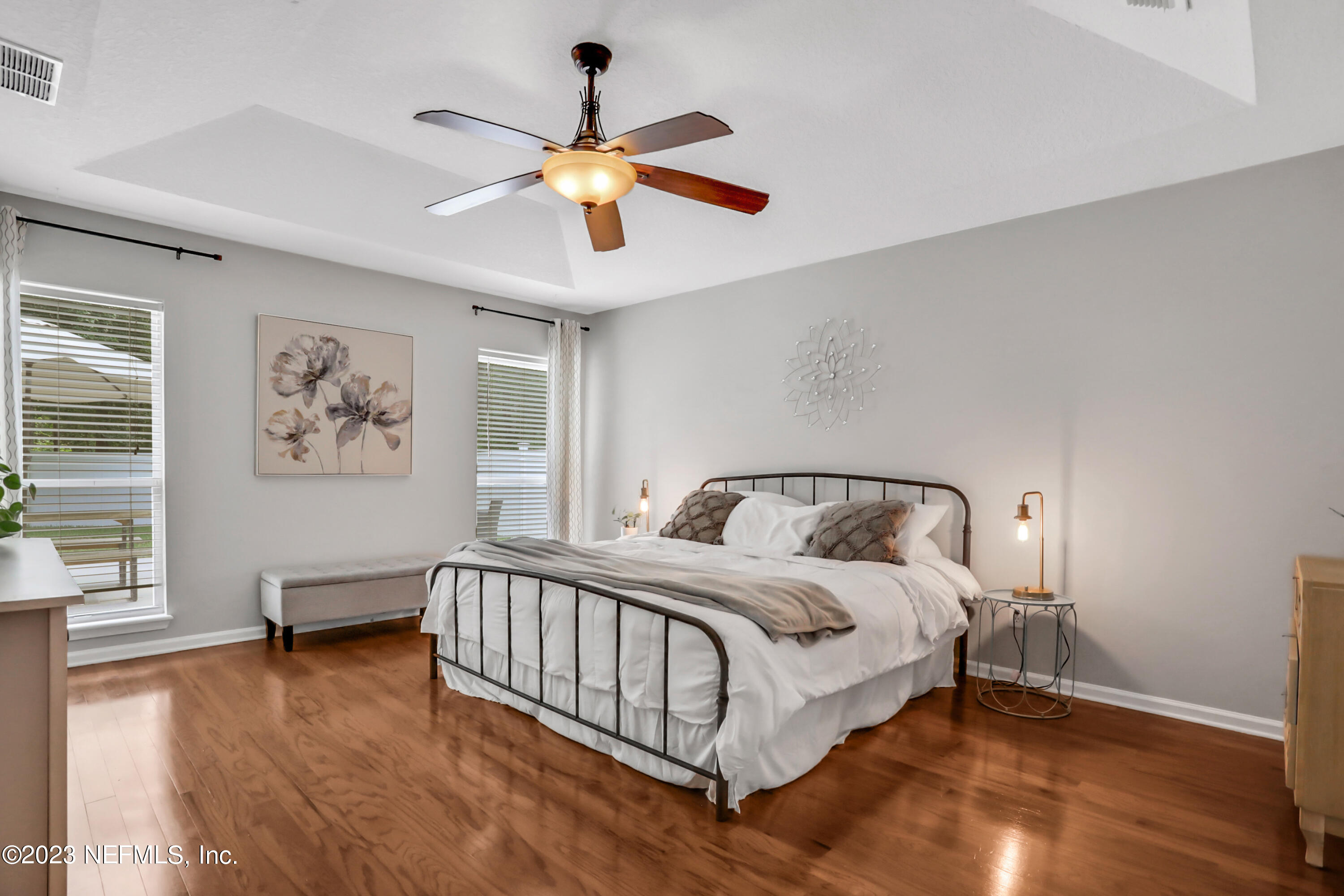 4100 Lonicera Loop St. Johns, FL 32259 - Photo 22 of 65 a spacious bedroom with a bed and a window