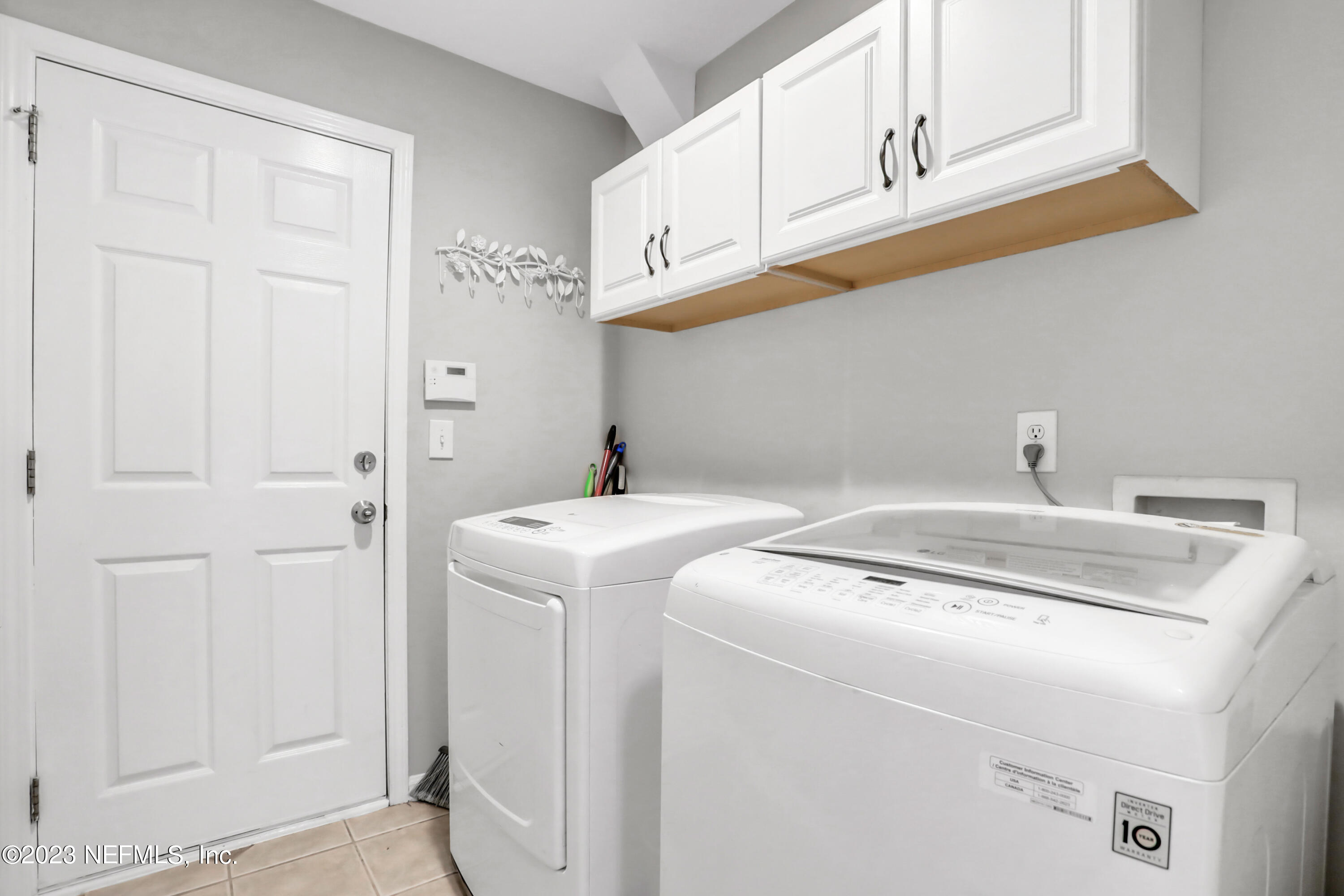 4100 Lonicera Loop St. Johns, FL 32259 - Photo 29 of 65 a utility room with dryer and washer