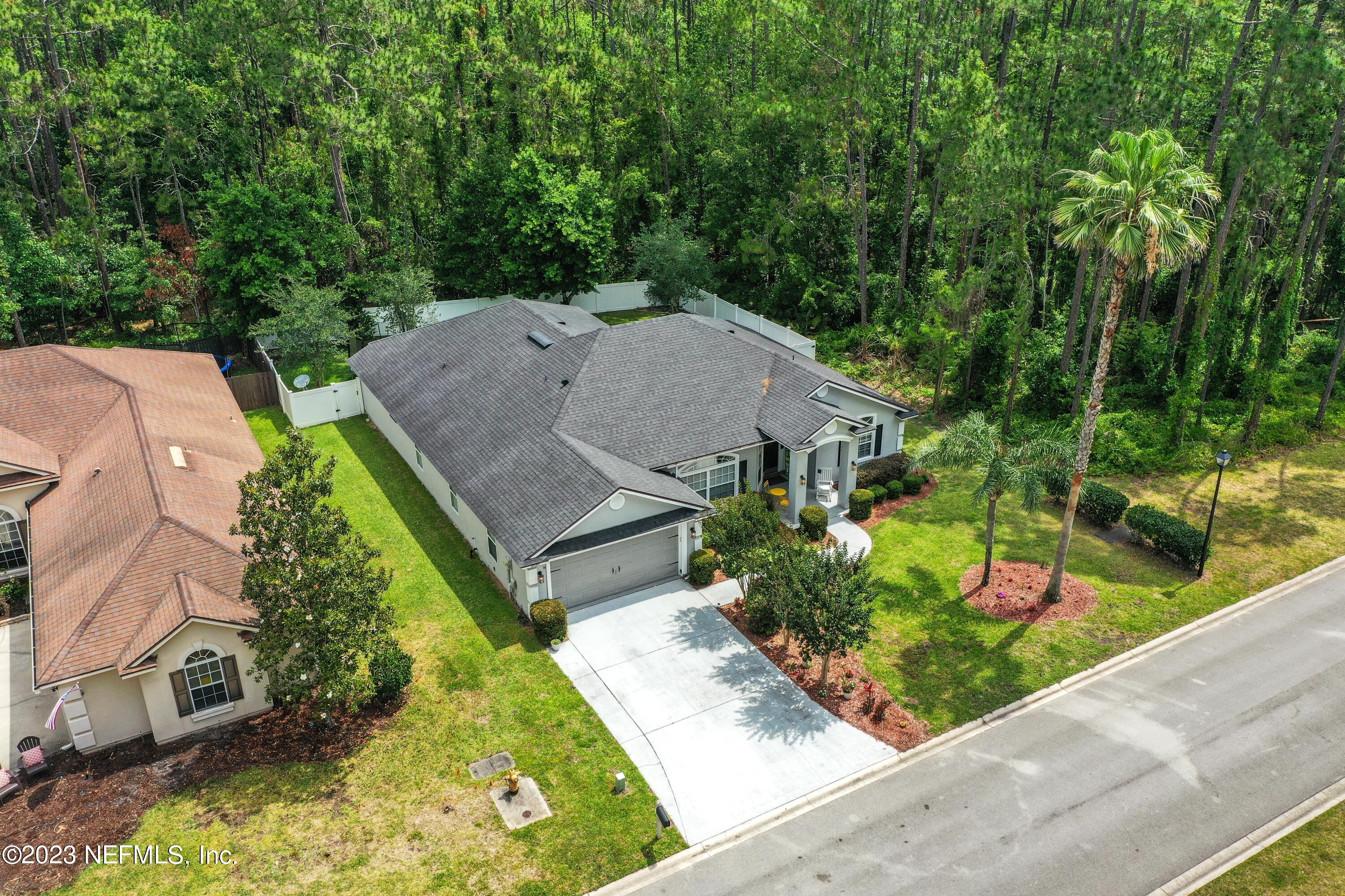 4100 Lonicera Loop St. Johns, FL 32259 - Photo 36 of 65 an aerial view of a house with a garden