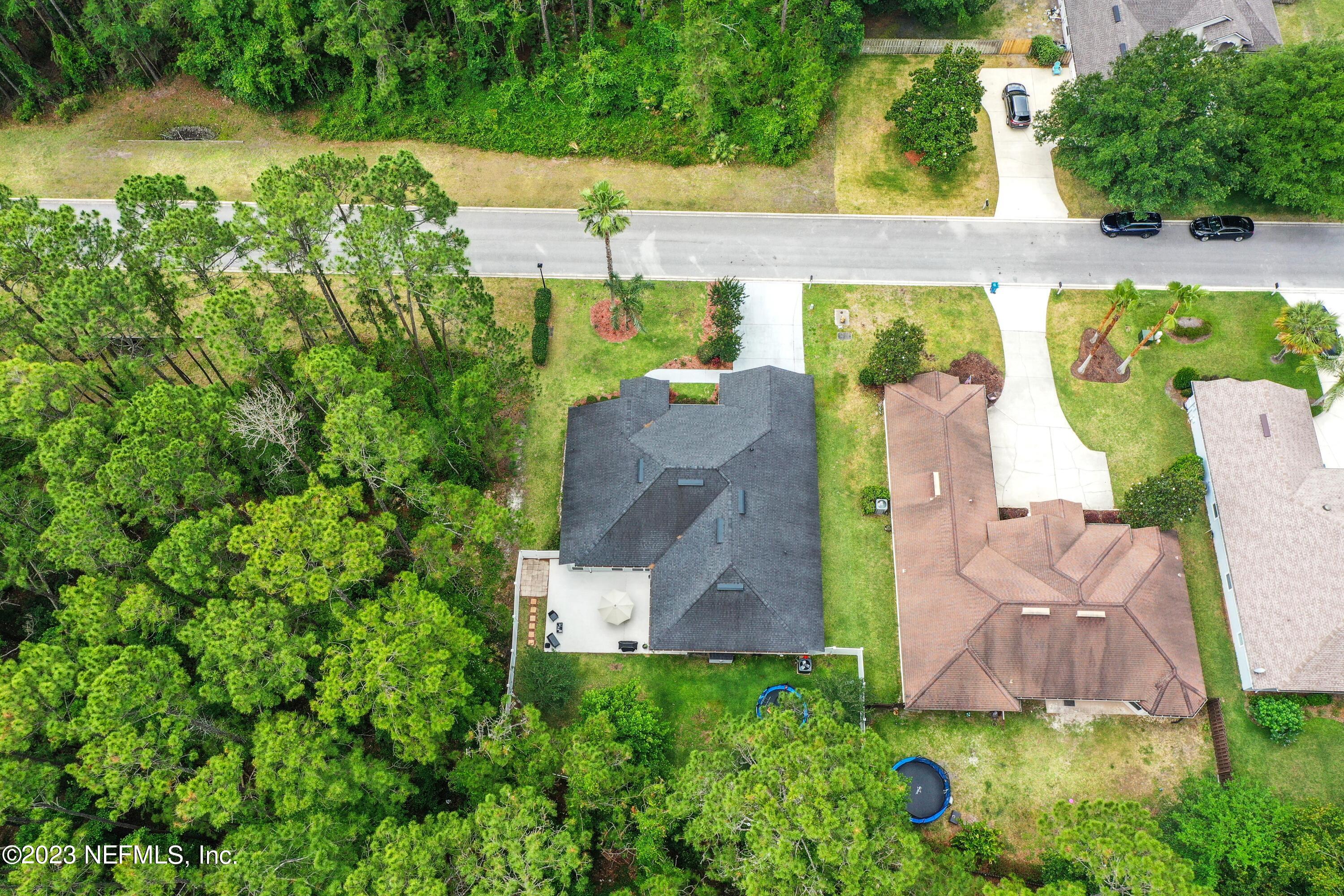 4100 Lonicera Loop St. Johns, FL 32259 - Photo 39 of 65 an aerial view of a house with a garden and yard