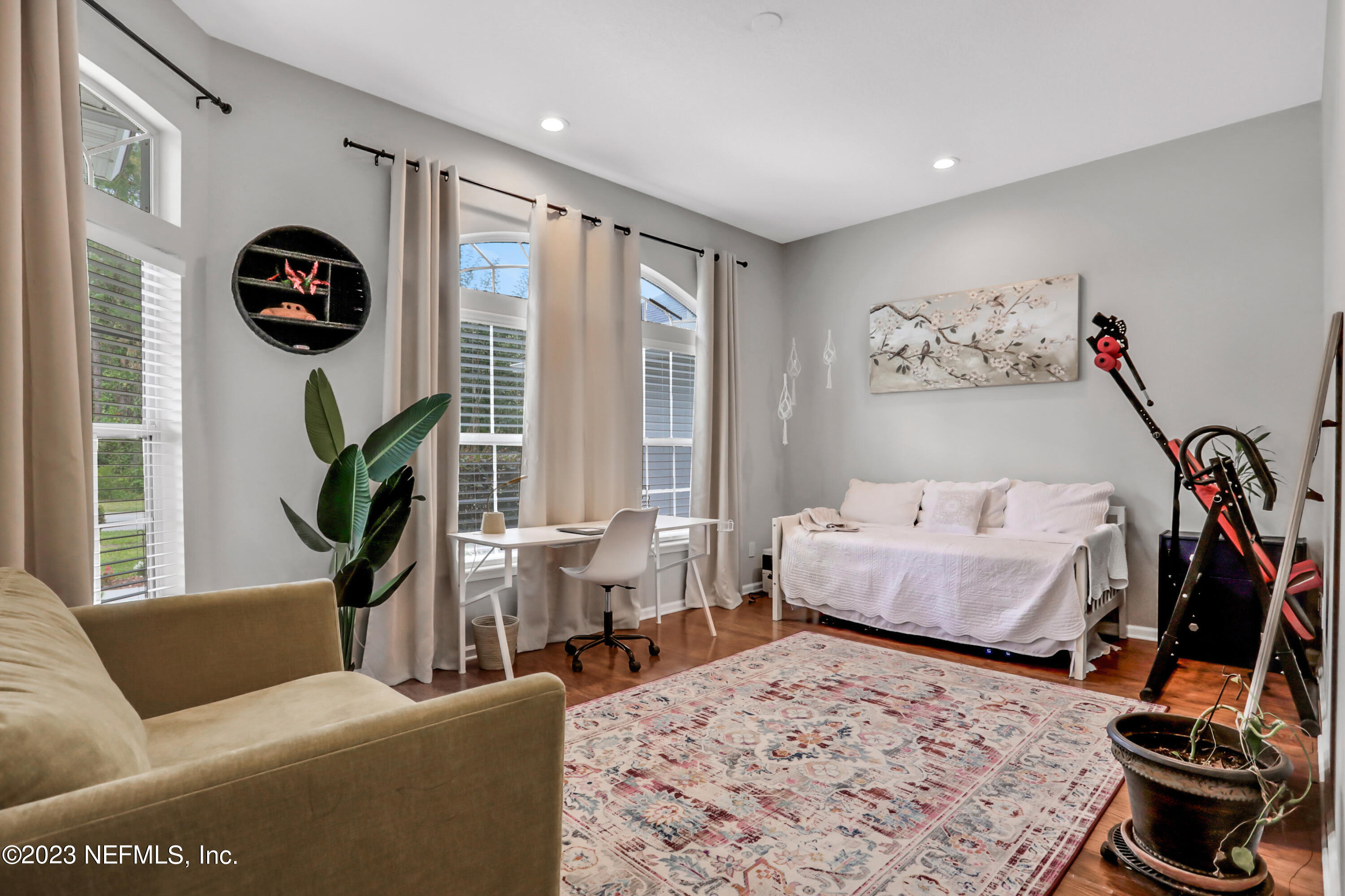 4100 Lonicera Loop St. Johns, FL 32259 - Photo 7 of 65 a living room with furniture and a flat screen tv