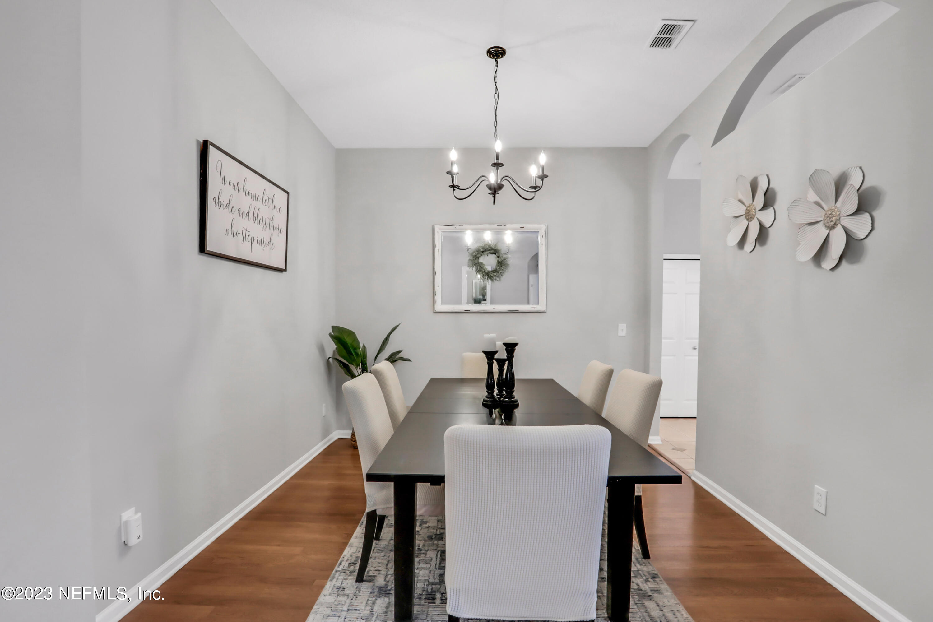 4100 Lonicera Loop St. Johns, FL 32259 - Photo 9 of 65 a view of a dining room with furniture and wooden floor
