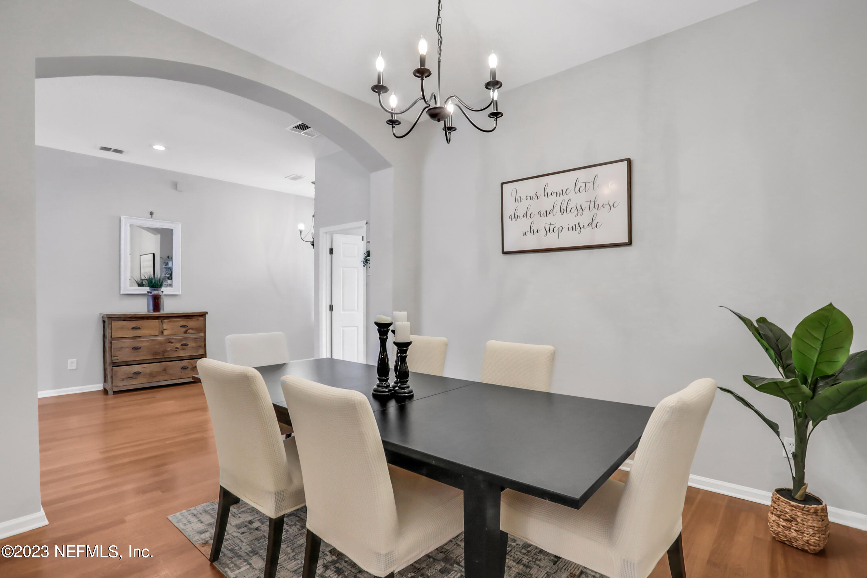 4100 Lonicera Loop St. Johns, FL 32259 - Photo 10 of 65 a view of a dining room with furniture window and wooden floor