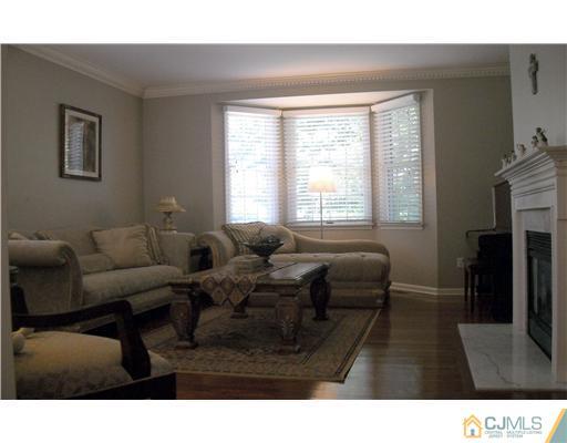 1 Barton Way Basking Ridge, NJ 07920 - Photo 4 of 20 a living room with furniture and a window