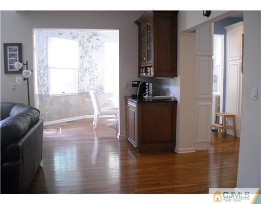 1 Barton Way Basking Ridge, NJ 07920 - Photo 8 of 20 a living room with furniture wooden floor and a window