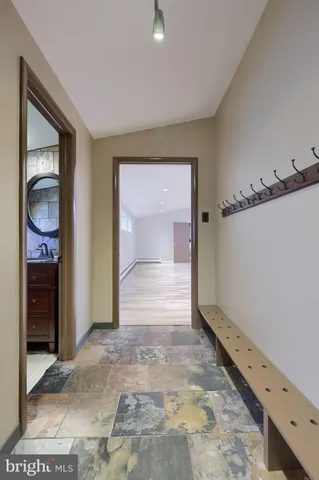 a workspace with furniture and window