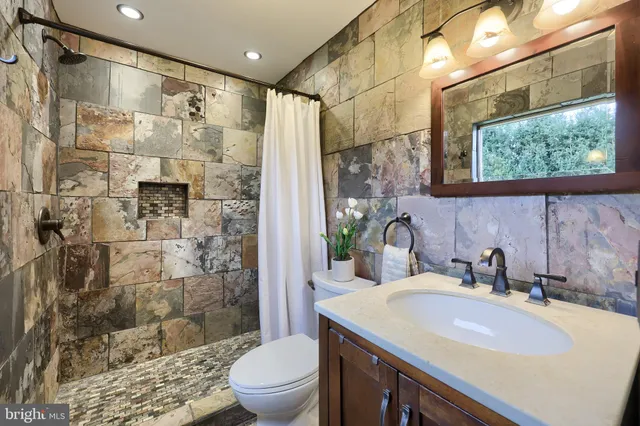 a bedroom with a bed and a closet