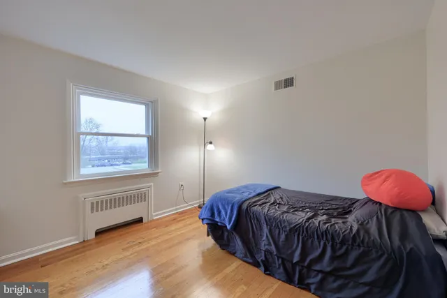 a view of a workspace with furniture and bedroom