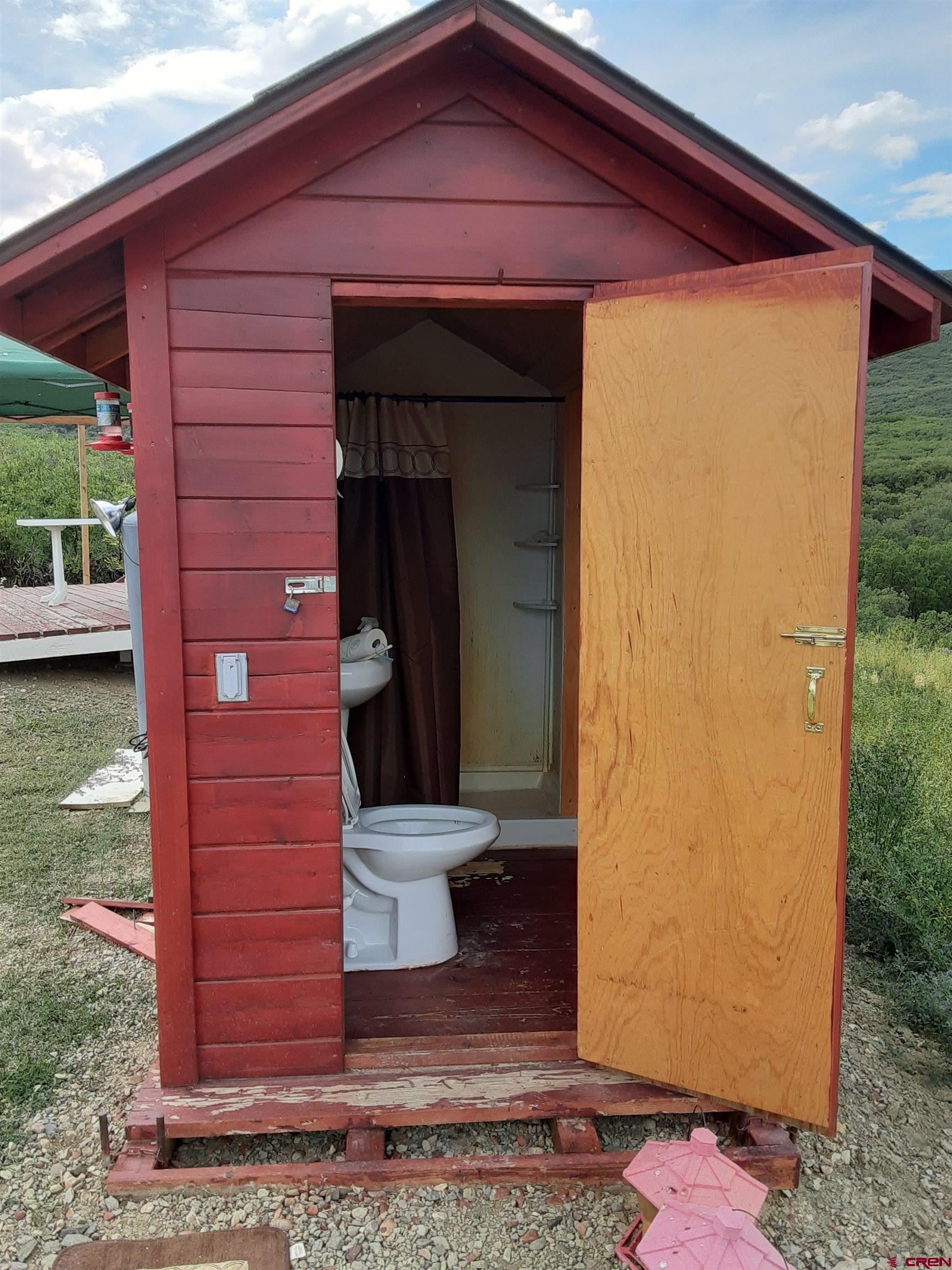 9723 Road 27.4 Dolores Co 81323 Norwood, CO 81423 - Photo 16 of 35 a view of a small house with a door