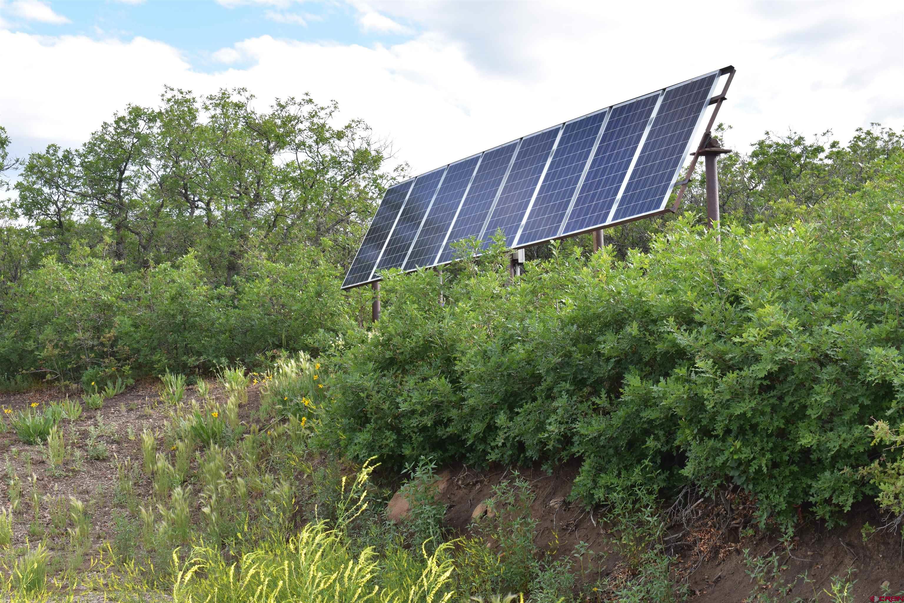 9723 Road 27.4 Dolores Co 81323 Norwood, CO 81423 - Photo 18 of 35 a view of yard with green space and wooden fence