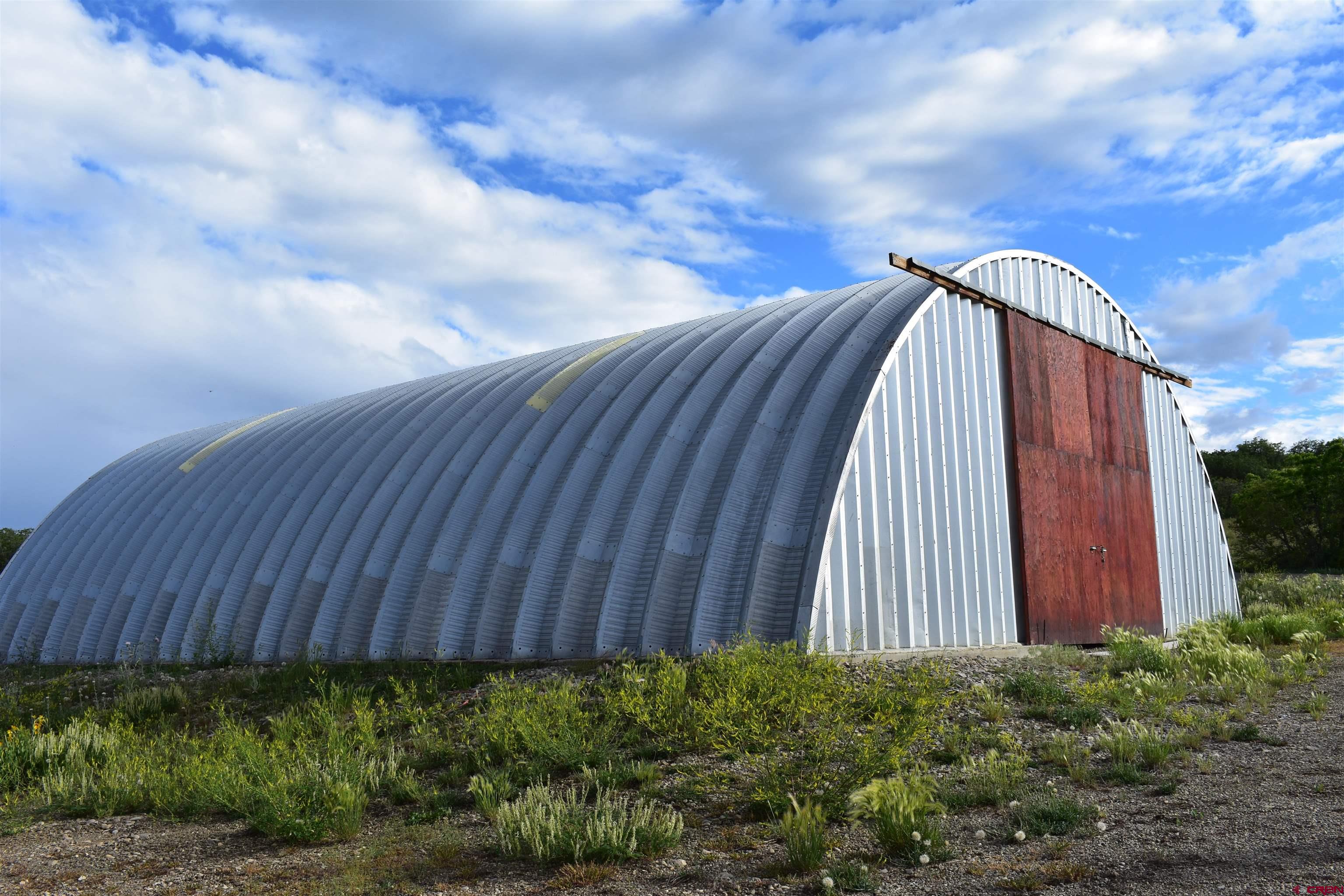 9723 Road 27.4 Dolores Co 81323 Norwood, CO 81423 - Photo 6 of 35 a view of a backyard with pathway