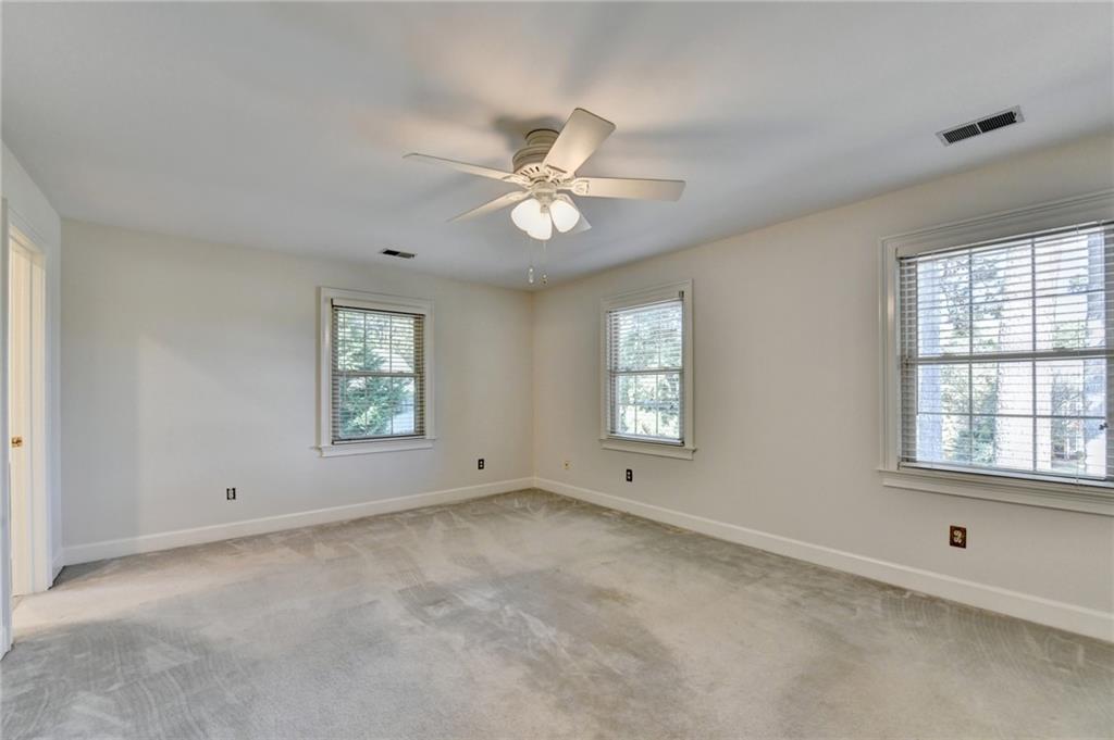 2859 Village Court Gainesville, GA 30506 - Photo 15 of 27 a view of an empty room with a window