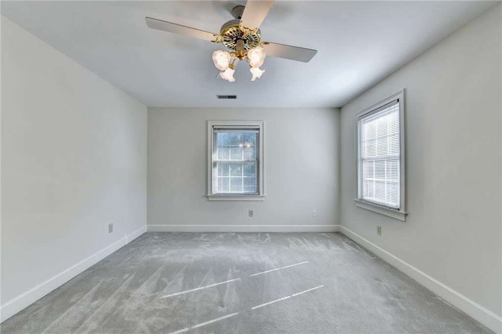 2859 Village Court Gainesville, GA 30506 - Photo 20 of 27 a view of an empty room with a window