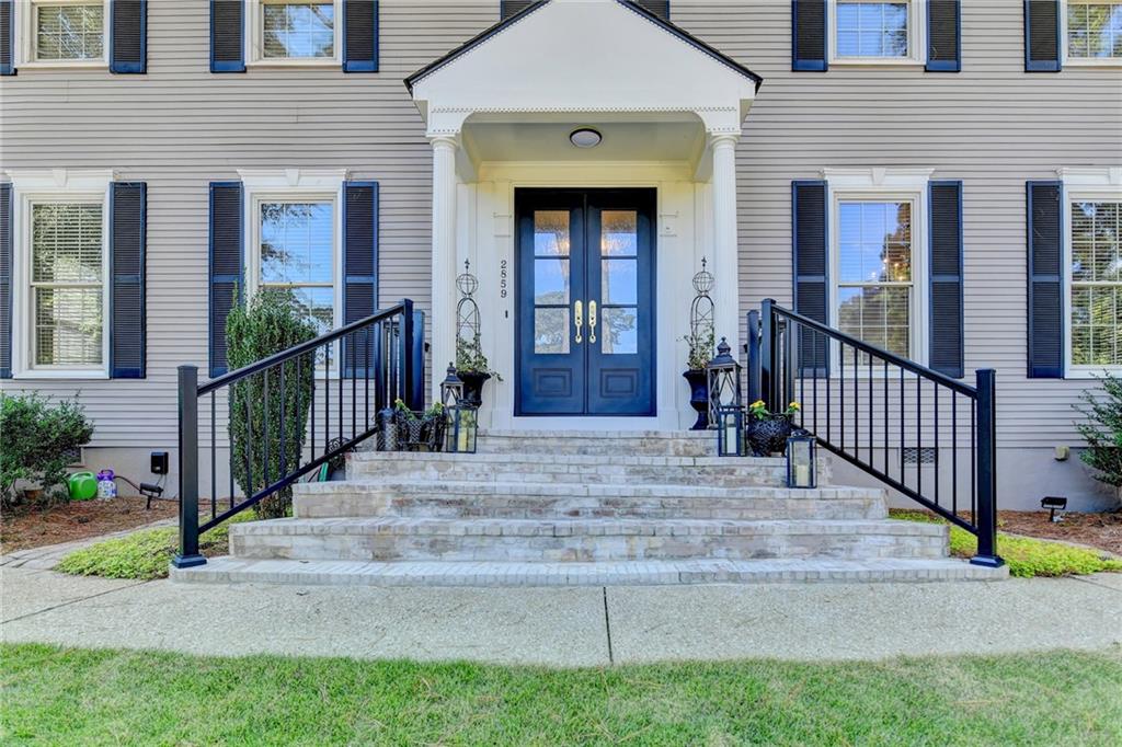 2859 Village Court Gainesville, GA 30506 - Photo 2 of 27 a view of a house with a balcony